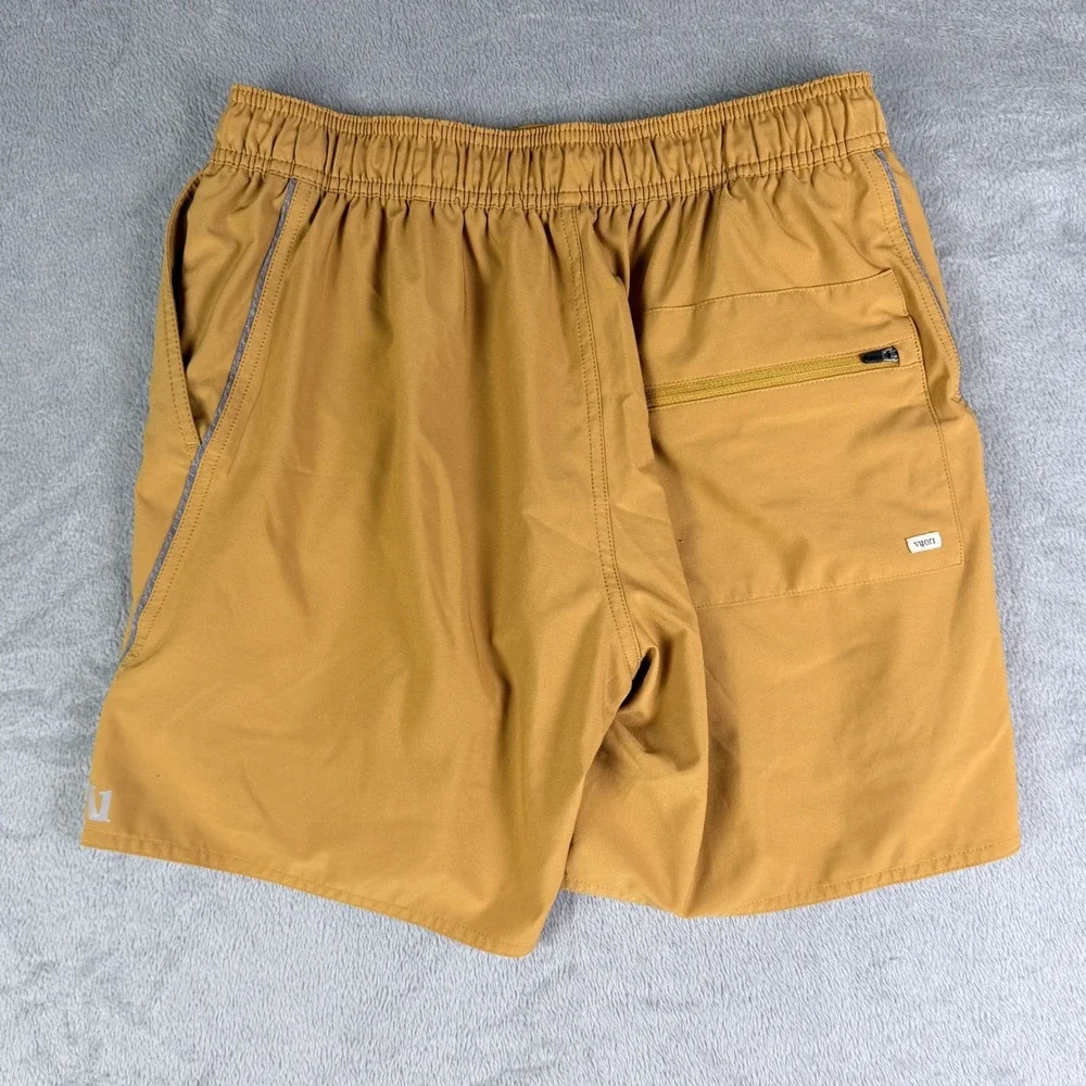 Vuori Kore Shorts Mens Mustard Yellow Ochre 7 Inch Inseam Lined Athletic Shorts